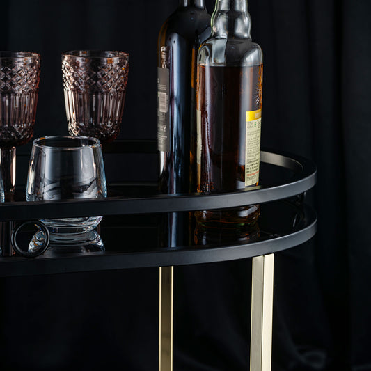 Sleek Black Serving Cart With Gold Trim
