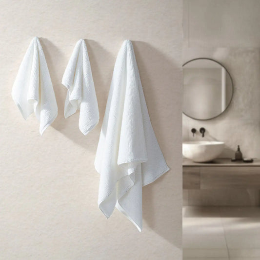 Earth Cotton 3-piece snow white towel set – 100% cotton towels hanging in modern bathroom