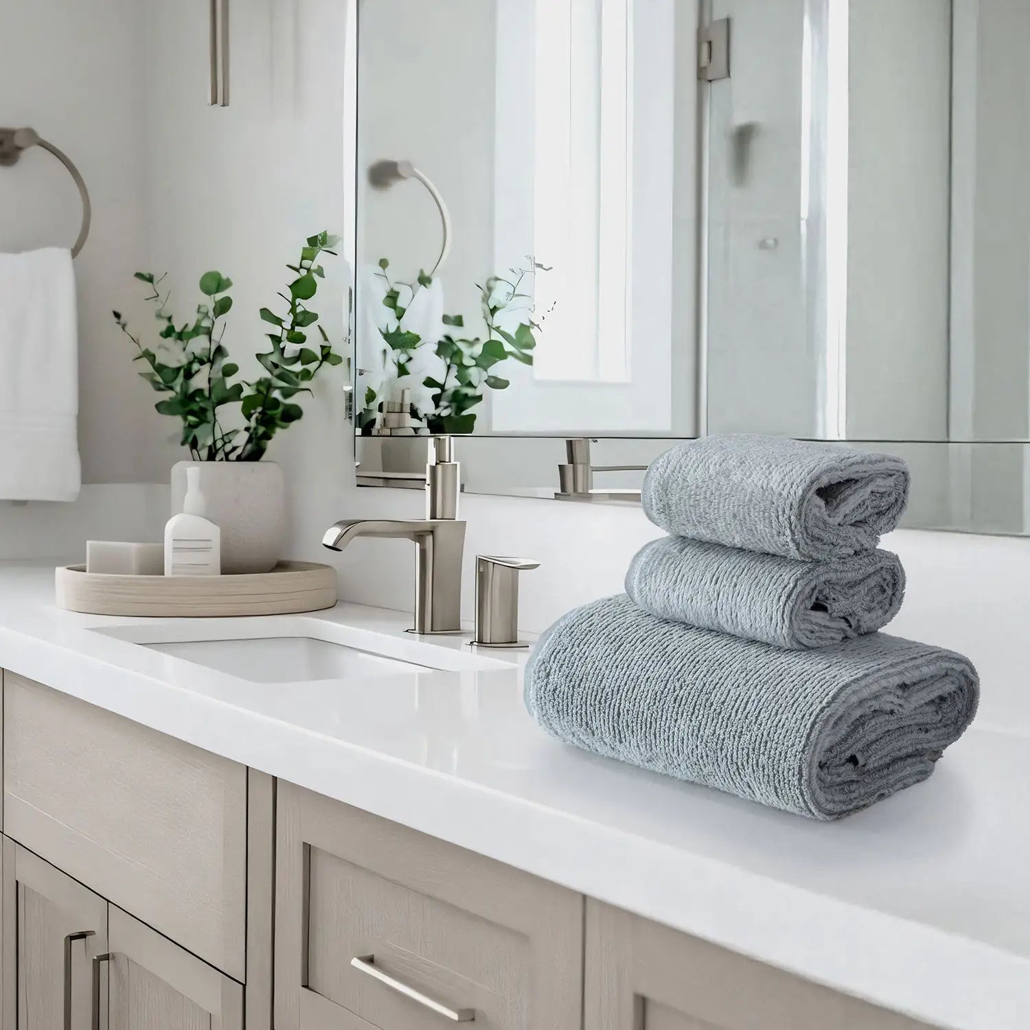Earth Cotton 3-piece silver towel set – 100% cotton towels stacked on bathroom counter