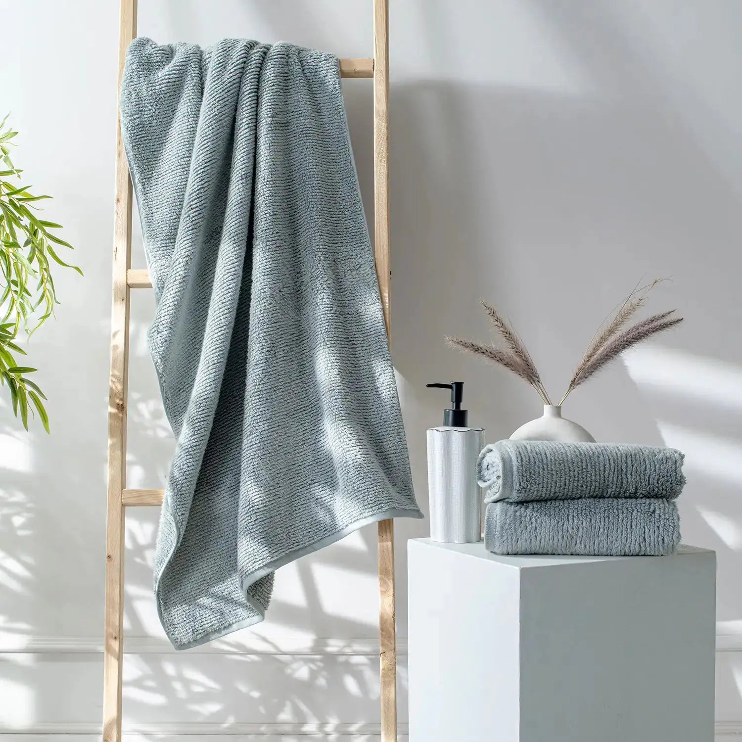 Earth Cotton 3-piece silver towel set – 100% cotton towels on ladder and pedestal
