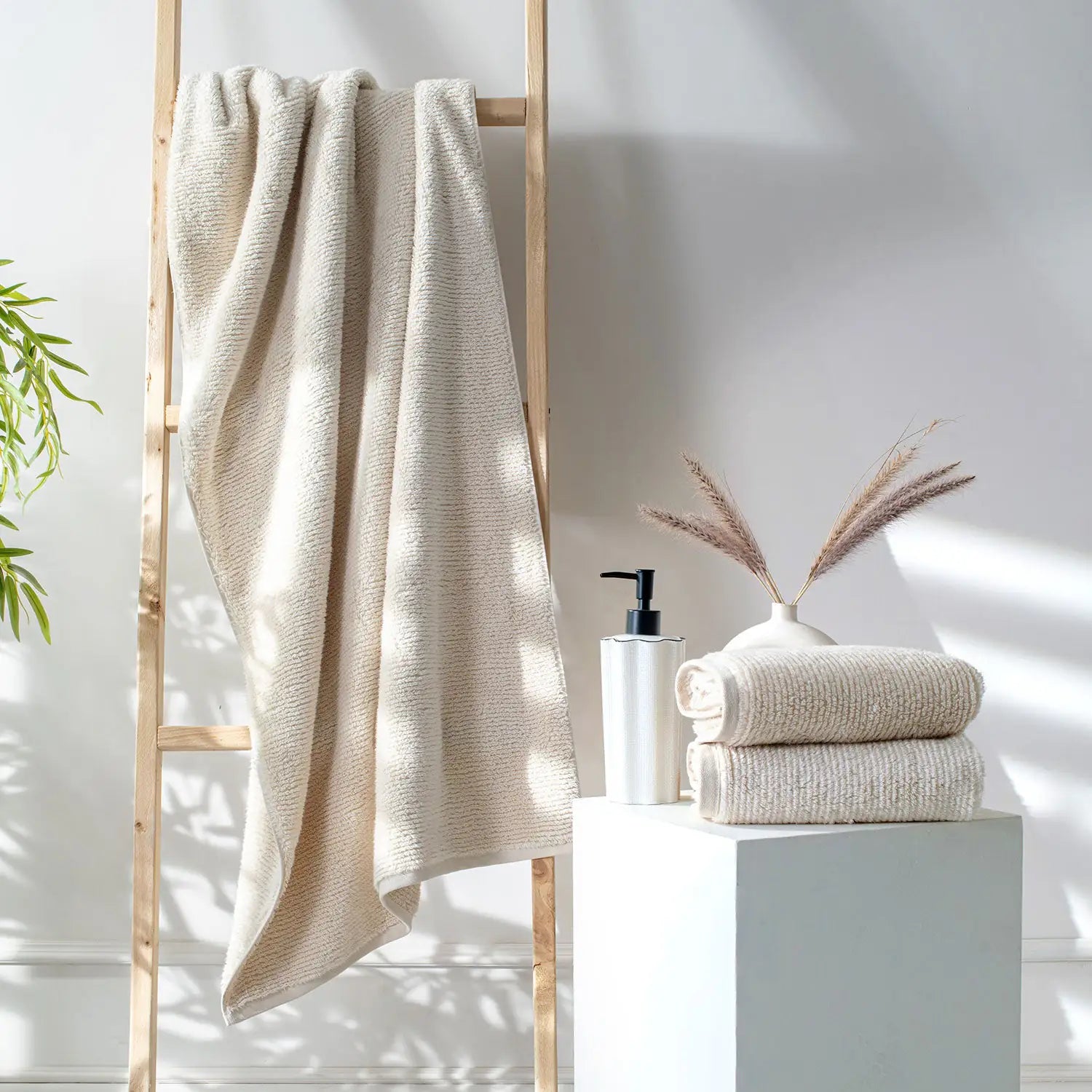 Earth Cotton 3-piece butter towel set – 100% cotton towels on ladder and pedestal
