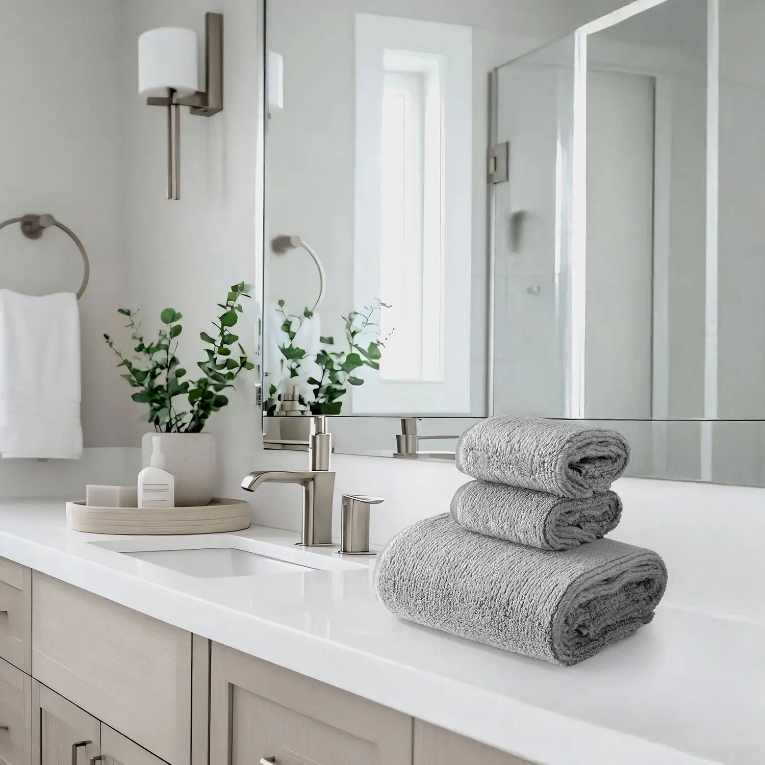Earth Cotton 3-piece stone towel set – 100% cotton towels stacked on bathroom counter