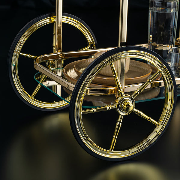 Sleek Glass Serving Cart With Gold Accents